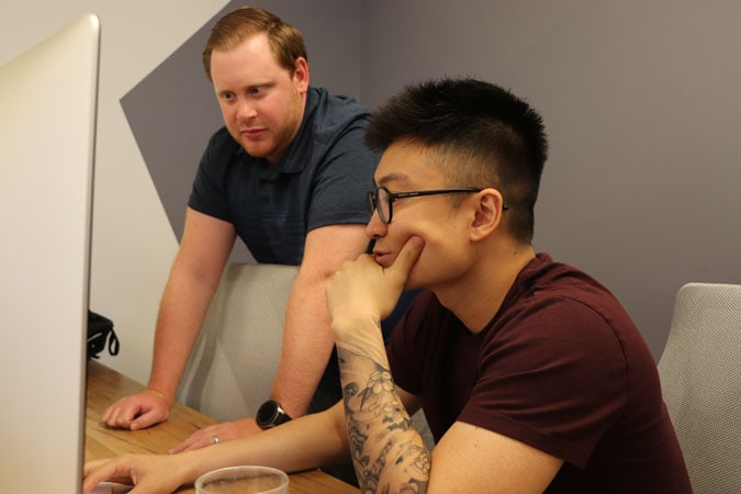 https://www.candyboxmarketing.com/wp-content/uploads/2021/11/Aaron-and-Tony-Staring-At-Screen.jpg