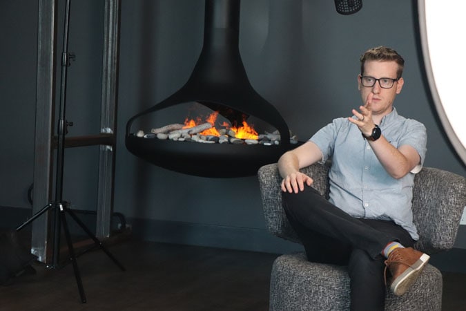 https://www.candyboxmarketing.com/wp-content/uploads/2021/11/BTS-Joel-on-Set-at-Custom-Fireplace-Design-2.jpg