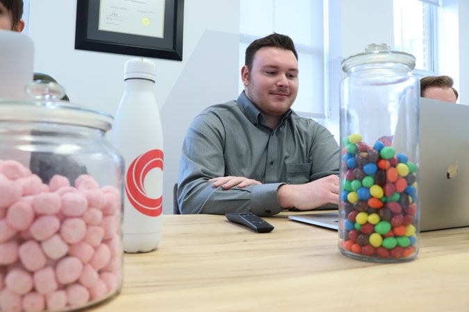 https://www.candyboxmarketing.com/wp-content/uploads/2021/11/Michael-Working-in-Boardroom-with-Candy.jpg