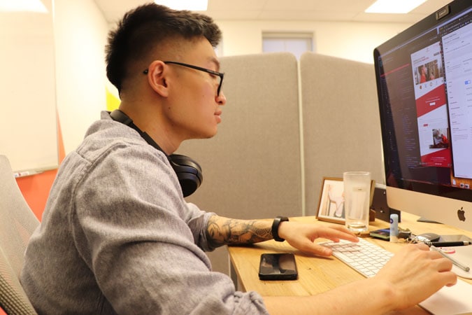 https://www.candyboxmarketing.com/wp-content/uploads/2021/11/Tony-Staring-At-Screen-in-Studio-2.jpg